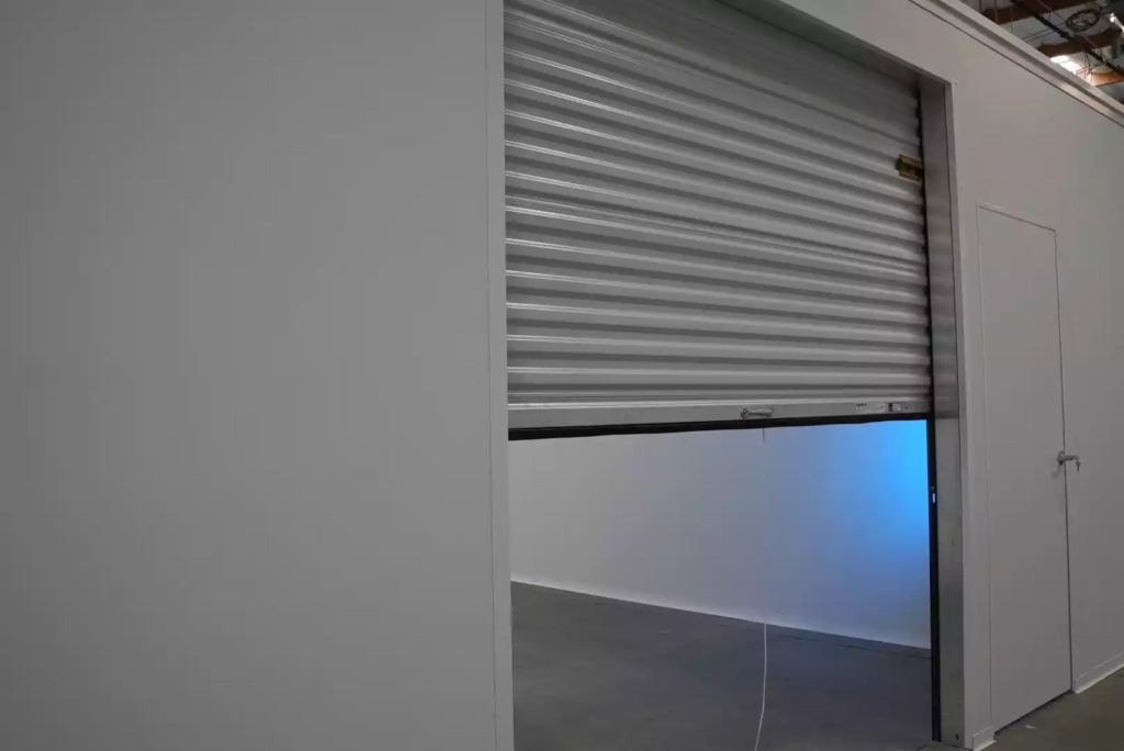 warehouse divider wall with a door that lifts open